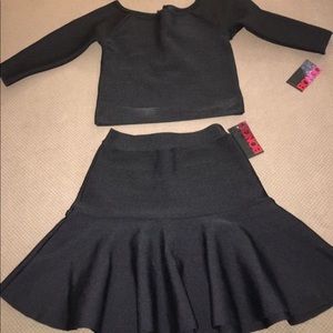 Black long-sleeved shirt and mini skirt set